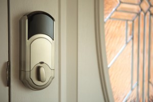 Door lock with security system attached